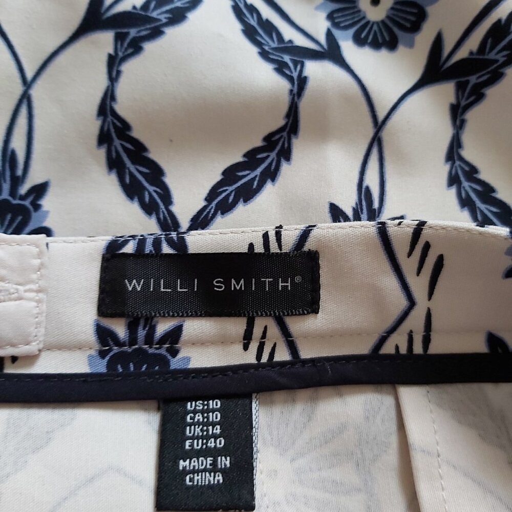 SKIRT WILLIE SMITH LABEL. NAVY PATTERNED ON WHITE BACKGROUND NEW NO TAGS SIZE 10